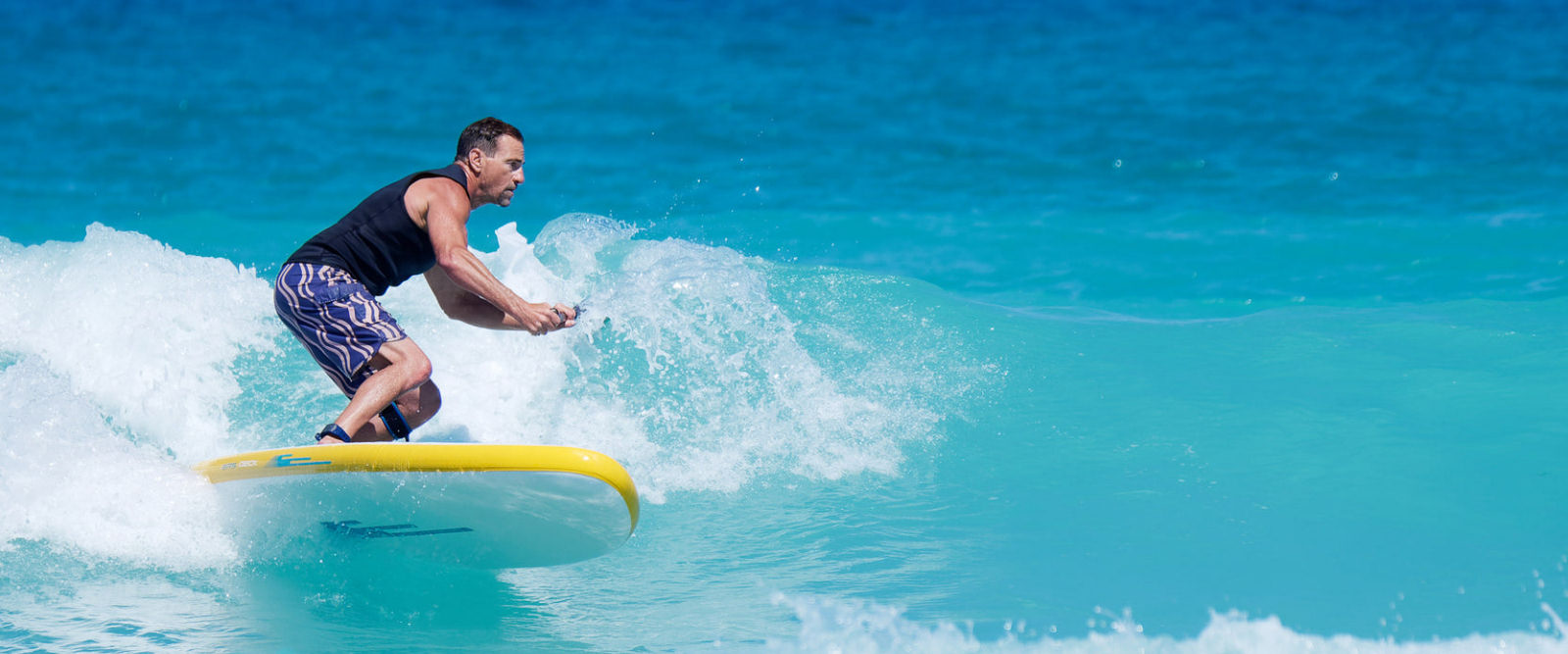 Expert surfer taking surf lessons in Pembrokeshire